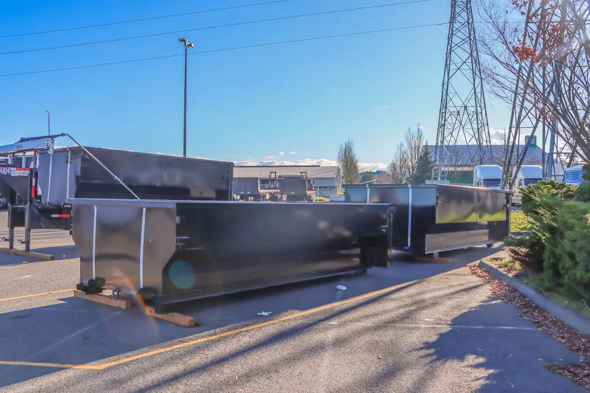 Roll-off dumpster ready for waste disposal at job site for Roofing Dumpster Rental in Newberry